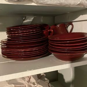 Ceramic dish set.   Dinner plates, salad plates, bowls, and mugs.